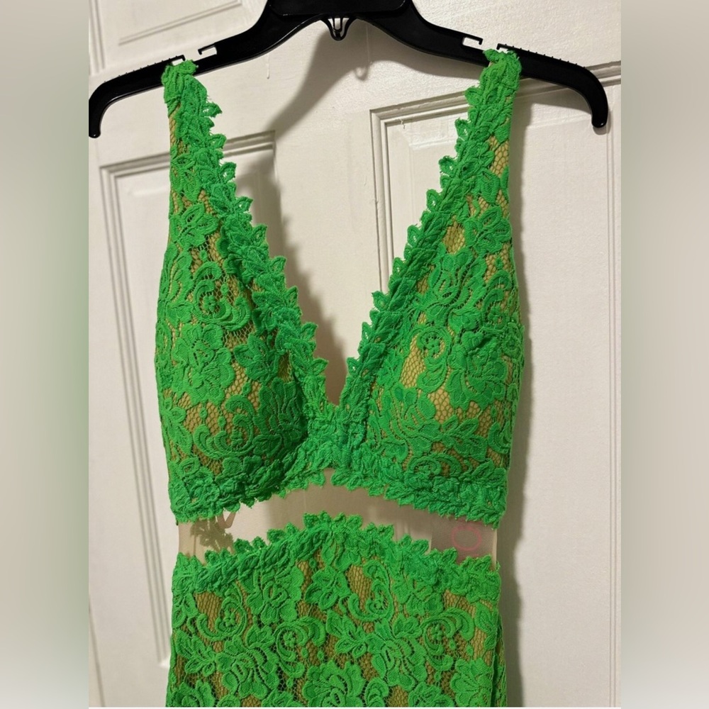 Beautiful green Jovani dress size 4. Brand new and never been worn or tailored.